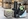 Man in forklift moving pallet of apples